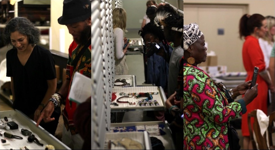 People examining the South African Collection in a museum