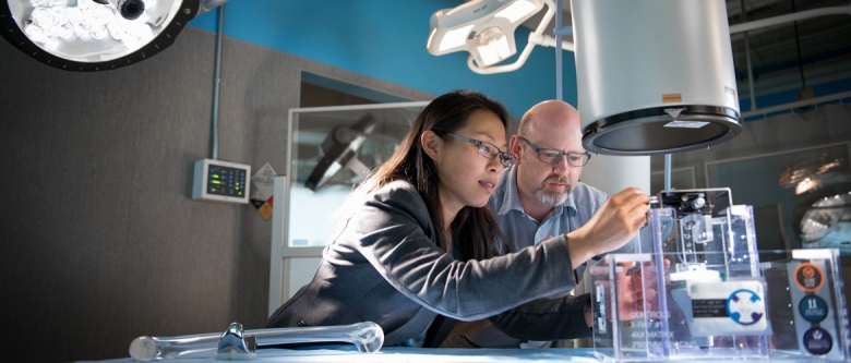 Master’s student Vivian Chung demonstrating her system for performing Roentgen Stereophotogrammetric Analysis (RSA) using standard C-arm fluoroscopy machines.