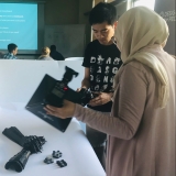 Students holding camera equipment
